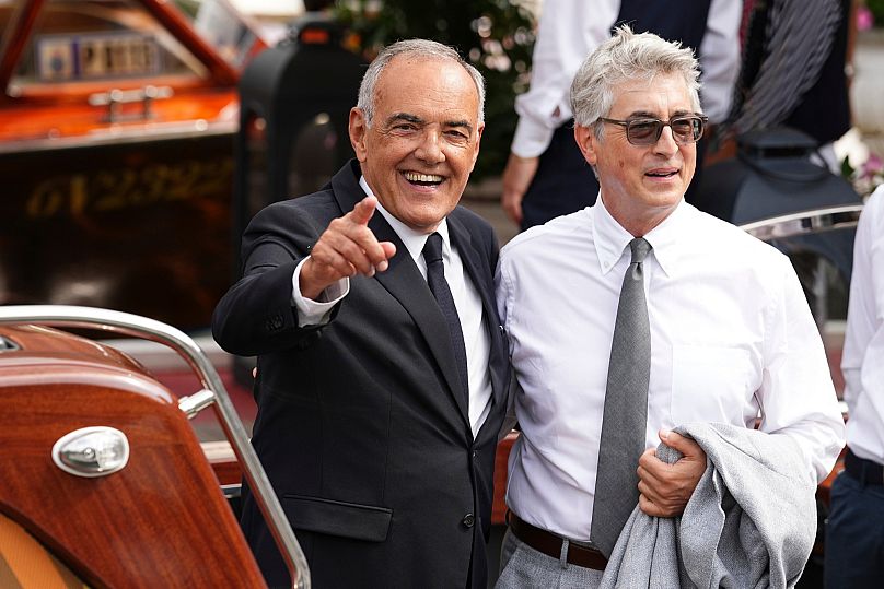 Festival director Alberto Barbera, left, and jury president Alexander Payne en route to Jury press conference, 27 August 2025