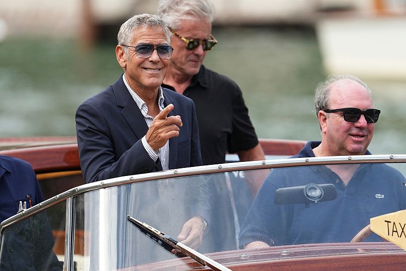 Here's looking at you: George Clooney arrives at the 82nd Venice Film Festival, Wednesday 27 August 