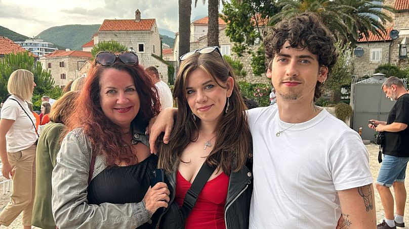 Ruby (centre) with her mum and brother in Montenegro. 