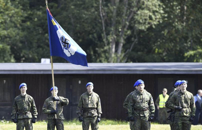FILE - The flag of Finnish Air Forces during a parade at the Santahamina garrison island in Helsinki, Finland, on July 31, 2019