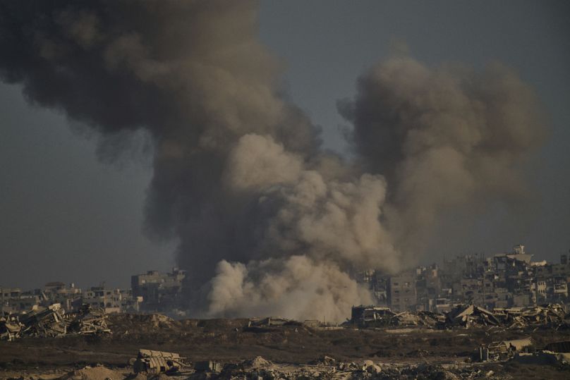 Smoke rises to the sky following an Israeli military strike in the northern Gaza Strip, as seen from southern Israel, Saturday, Aug. 30, 2025. (AP Photo/Leo Correa)