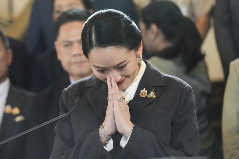 Thailand's suspended Prime Minister Paetongtarn Shinawatra gestures during a press conference after her dismissal, in Bangkok, Thailand, Friday, Aug. 29, 2025. (AP Photo/Sakch