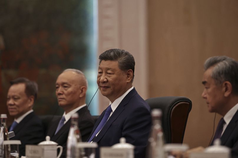 China's President Xi Jinping, centre, speaks during a bilateral meeting with Nepalese Prime Minister KP Sharma Oli, ahead of the Shanghai Cooperation Organization (SCO) Summit
