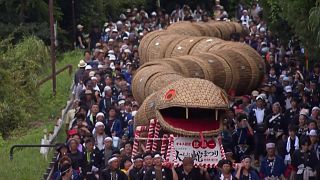 Giant bamboo snake parades through Japanese village