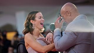 Dwayne Johnson and Emily Blunt walk the red carpet in Venice for 'The Smashing Machine'