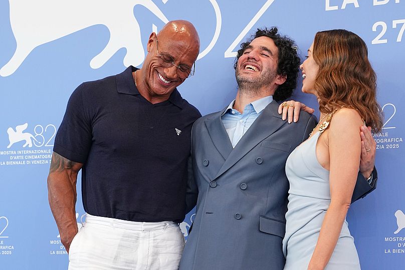 Dwayne Johnson, from left, director Benny Safdie and Emily Blunt during the 82nd edition of the Venice Film Festival in Venice, Italy, on Monday, Sept. 1, 2025. 