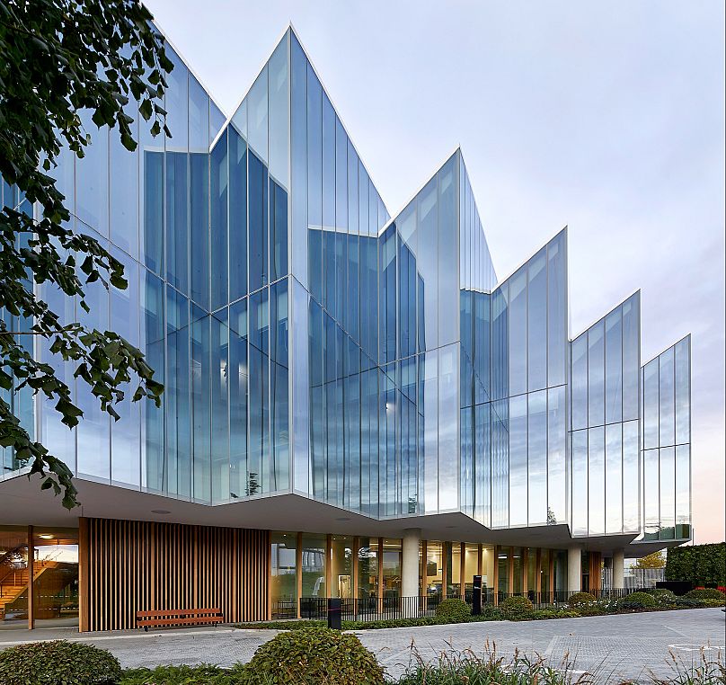 Lengthy delays caused by the firm's need to focus on the COVID 19 vaccine added to the building's complicated history.