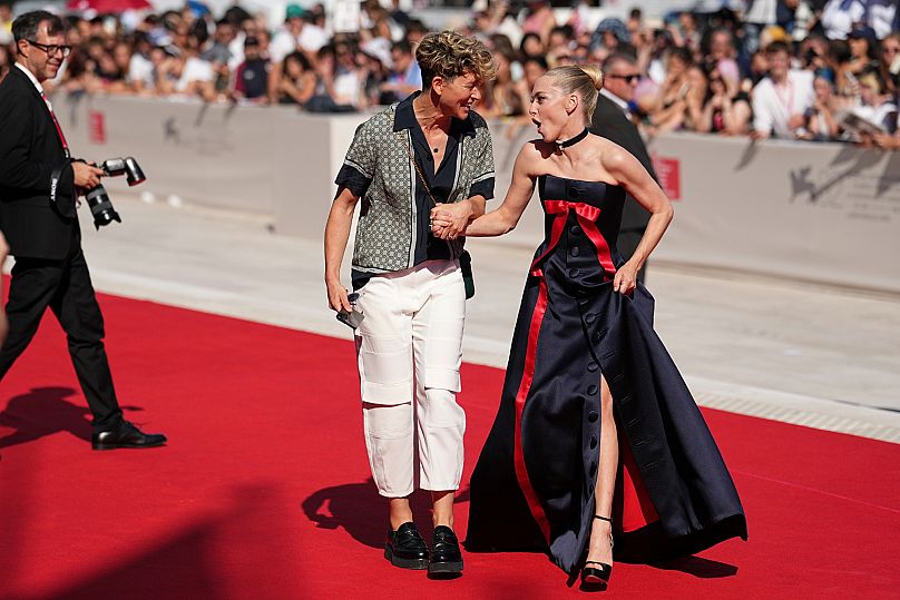 Mia Lidofsky, left, and Amanda Seyfried pose for photographers at the red carpet for the film 'The Testament of Ann Lee' 