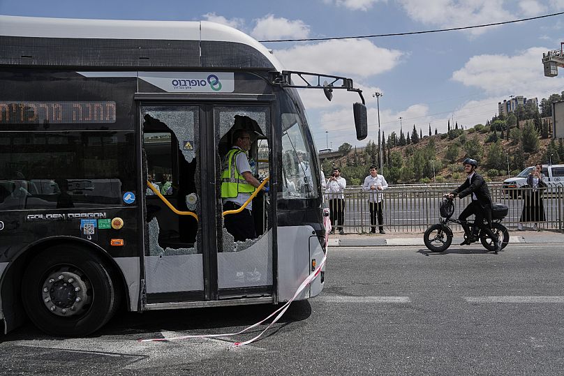Israeli police and rescue teams inspect the scene of a shooting attack carried out by two Palestinian gunmen in Jerusalem, 8 September, 2025