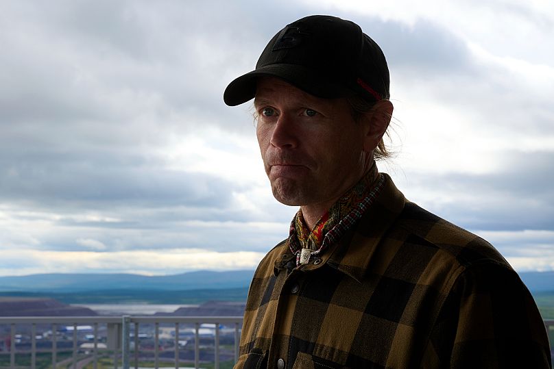 Lars-Marcus Kuhmunen, a Sami reindeer herder and chairman of Sami village of Gabna, grimaces in Kiruna, Sweden.