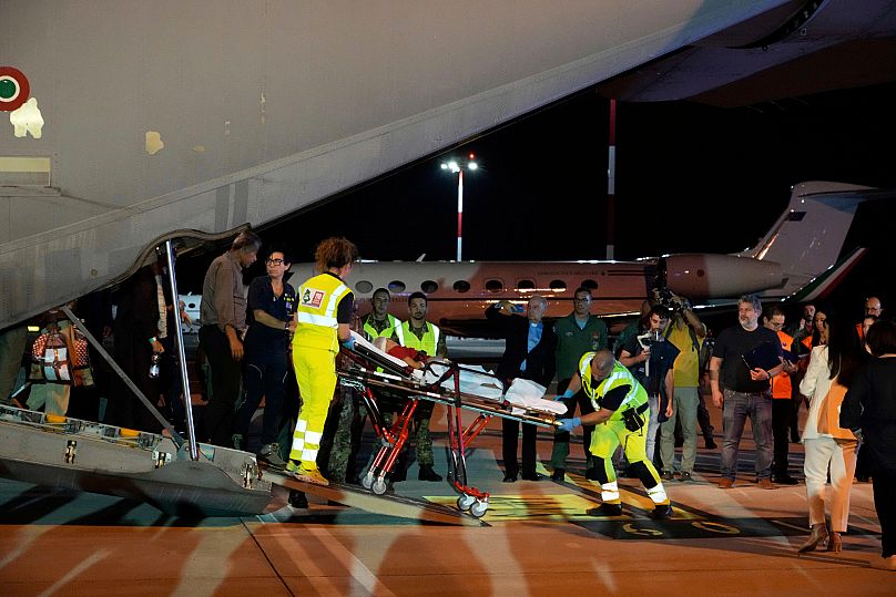 FILE: Palestinian children and their families evacuated from Gaza arrive at Rome's Ciampino airport, 14 August 2025