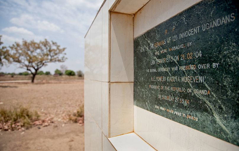 In this file photo taken Thursday, Feb. 12, 2015, a memorial marks a mass burial site of those massacred in 2004 by the Lord's Resistance Army in Uganda