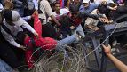 Clashes in Tbilisi as ruling party supporters target opposition rally