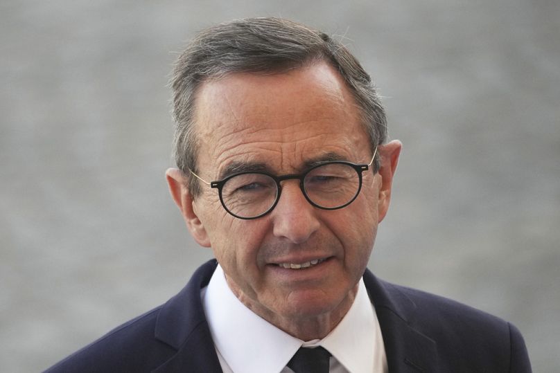 French Interior Minister Bruno Retailleau arrives for the Bastille Day parade, Monday, July 14, 2025 in Paris.