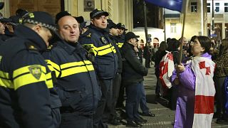 Clashes in Tbilisi as ruling party supporters target opposition rally