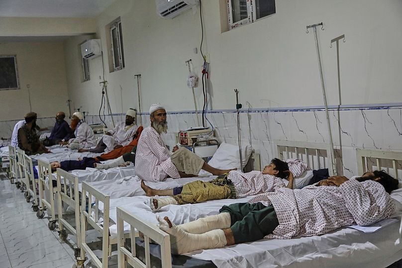 Afghans injured in a powerful earthquake lie on beds at Nangarhar Regional Hospital in Jalalabad, 3 September, 2025