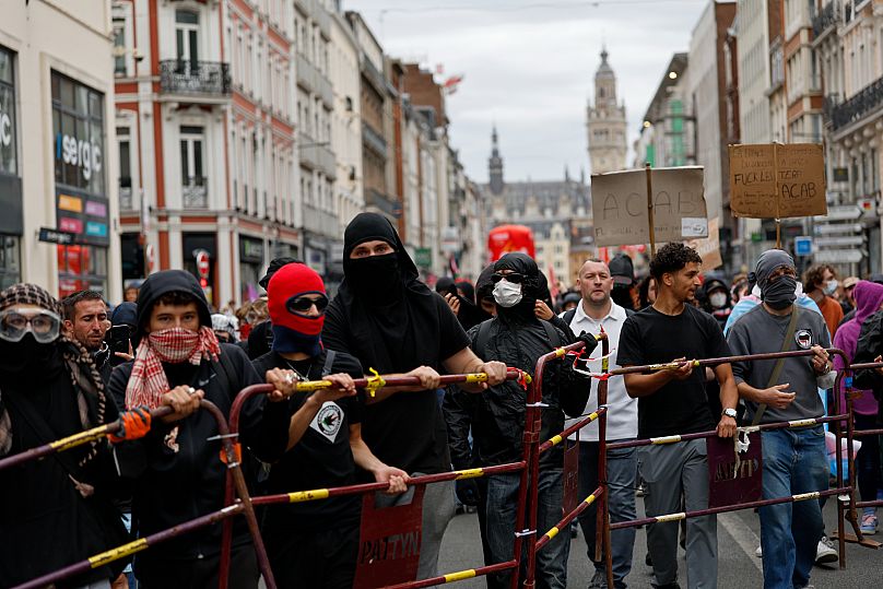 Protesters of the of the "Block Everything" movement setting a barricade during a rally in Lille, 10 September, 2025