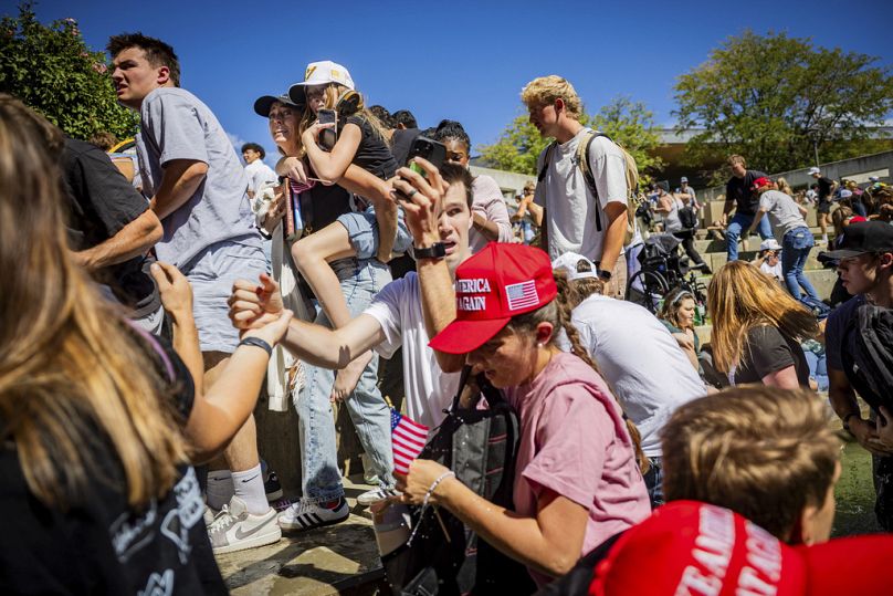 The crowd reacts after Charlie Kirk, the CEO and co-founder of the conservative youth organization Turning Point USA, is shot at the Utah Valley University, Sept. 10, 2025