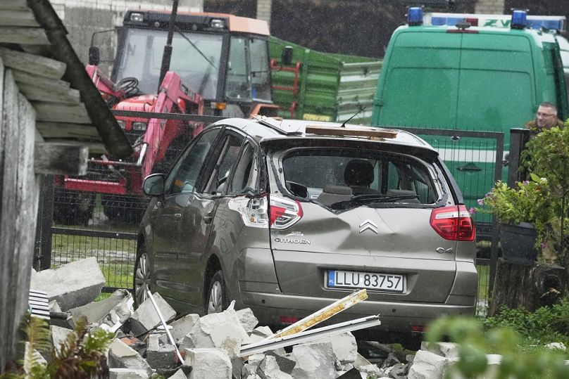 A car damaged by debris falling from a destroyed roof, after Russian drones violated Polish airspace during an attack on Ukraine, in Wyryki near Lublin, Poland, Sep. 11, 2025
