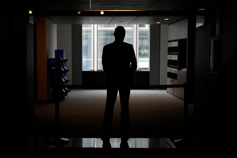 A security officer in a corridor after searching the office of German MEP Maximilian Krah at the European Parliament in Brussels, 7 May, 2024