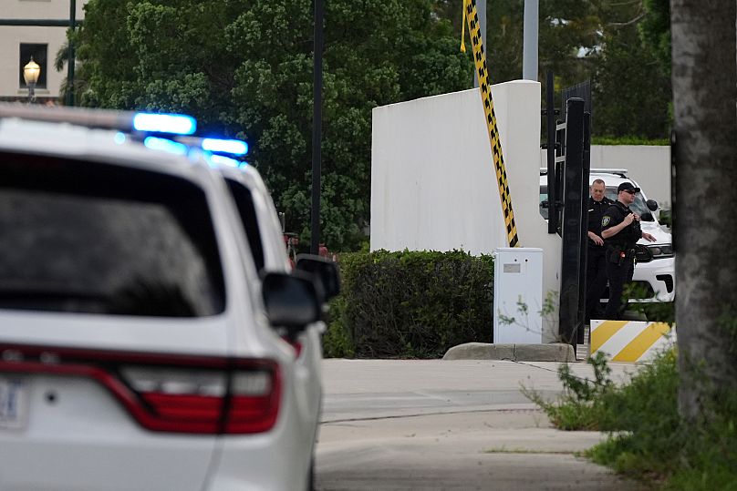 FILE: Law enforcement officials stand guard at an entrance to courthouse in Florida, 8 September 2025