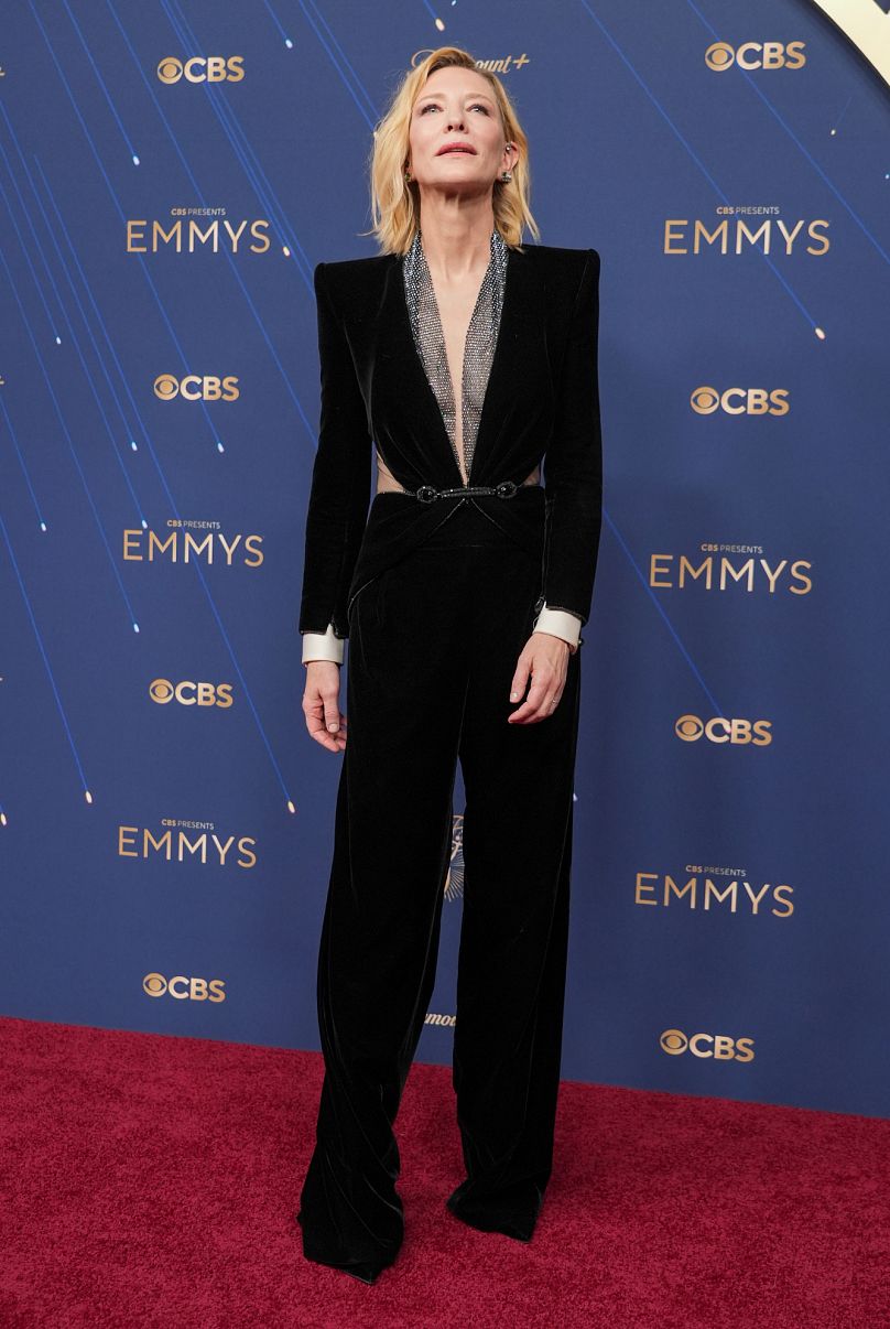Cate Blanchett paid tribute to the late Giorgio Armani in a black and silver mesh Armani Privé jumpsuit.