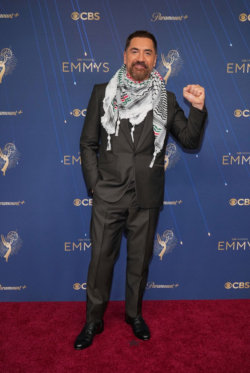 Javier Bardem made a statement on the Emmy red carpet in a Palestinian keffiyeh scarf. 