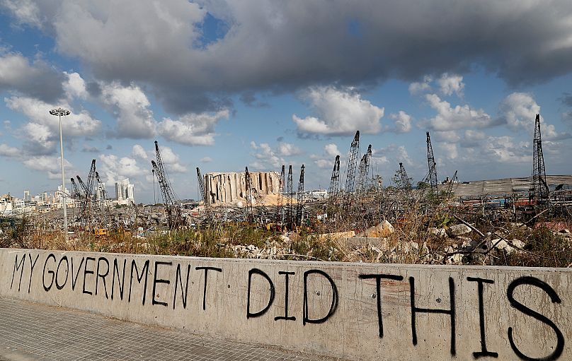 Graffiti written by Lebanese citizens in front of the scene of the explosion at the port of Beirut, 9 August, 2020