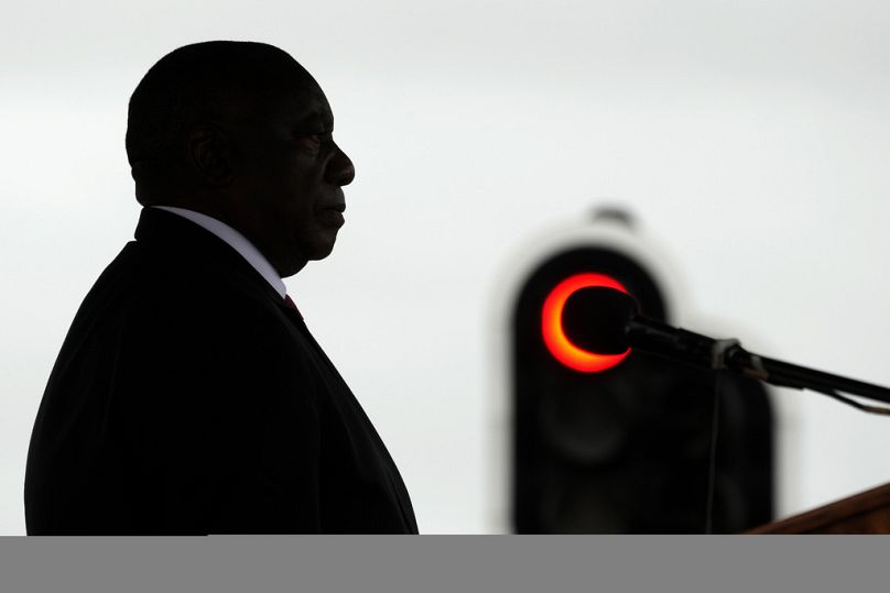 FILE - South African President Cyril Ramaphosa is silhouetted as he addresses members of the defence forces, Richards Bay, South Africa, Feb. 21 2023