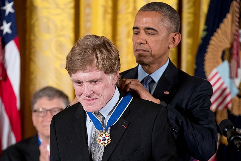 President Barack Obama presents the Presidential Medal of Freedom to Robert Redford during a ceremony in the East Room of the White House - 2016