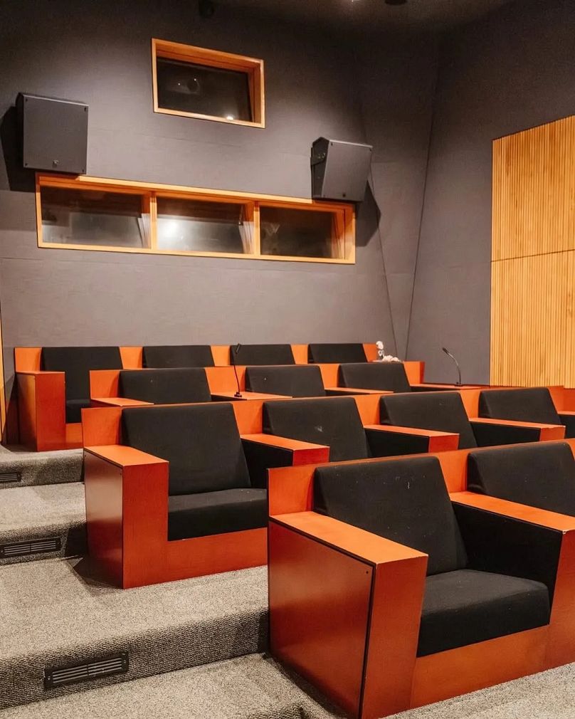 The compound includes a private screening room. 