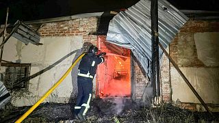 Administrative building hit in Kharkiv as drone targets busy street