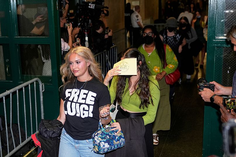 Members of the public enter a courtroom before Luigi Mangione is escorted in in New York, 16 September, 2025