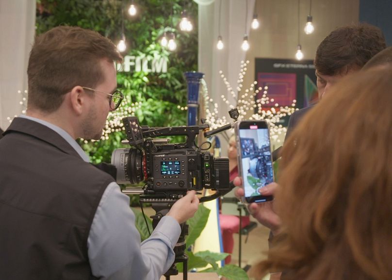 Presentazioni nello stand di Fujifilm all'IBC di Amsterdam