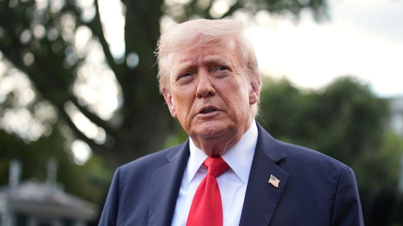 FILE: President Donald Trump speaks with reporters before boarding Marine One on the South Lawn of the White House, Thursday, Sept. 11, 2025, in Washington