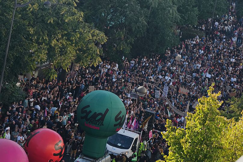 Protesters march during a demonstration called by major trade unions to oppose budget cuts in Paris, 18 September, 2025