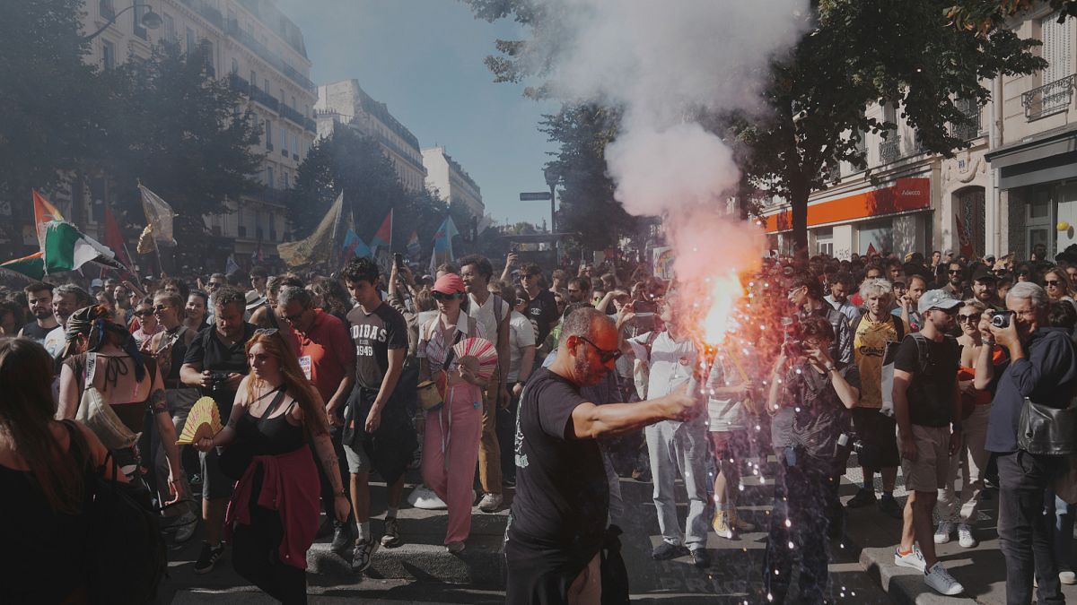 Clashes erupt in Paris as protesters rally against Macron government