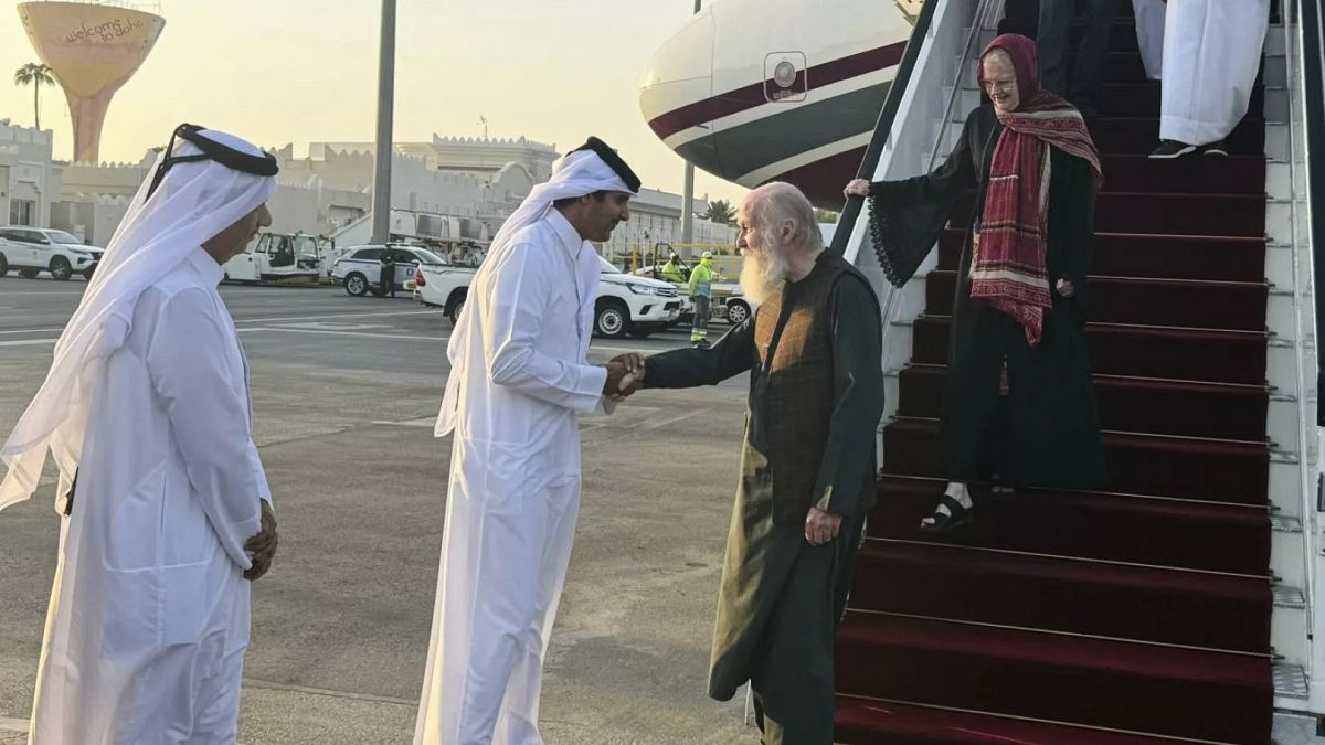 British couple released by the Taliban after months in jail touch down in Doha