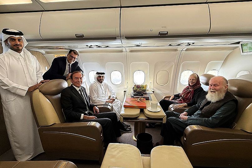 British couple, Barbie and Peter Reynolds, aboard a plane before departing to Qatar from Kabul, Afghanistan, Friday, Sept. 19, 2025. 