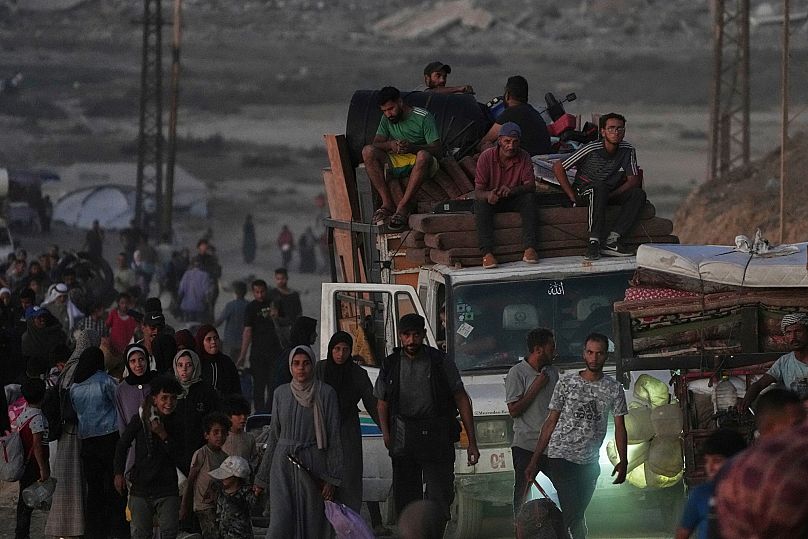 Displaced Palestinians flee Gaza City along the coastal road in Nuseirat toward the southern Gaza Strip, 19 September, 2025