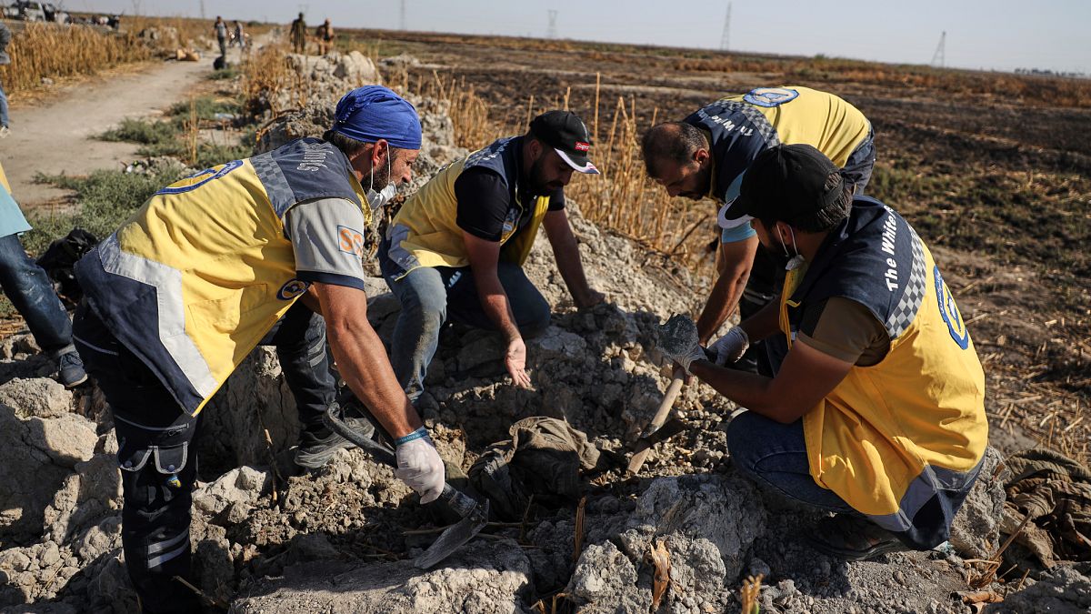 25 bodies recovered from a mass grave near Damascus, site believed to hold at least 175