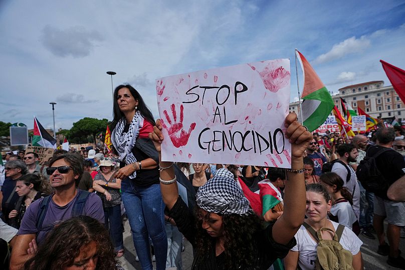 People take part in a demonstration in Rome part of a nationwide protest and general strike against the war in Gaza, 22 September, 2025