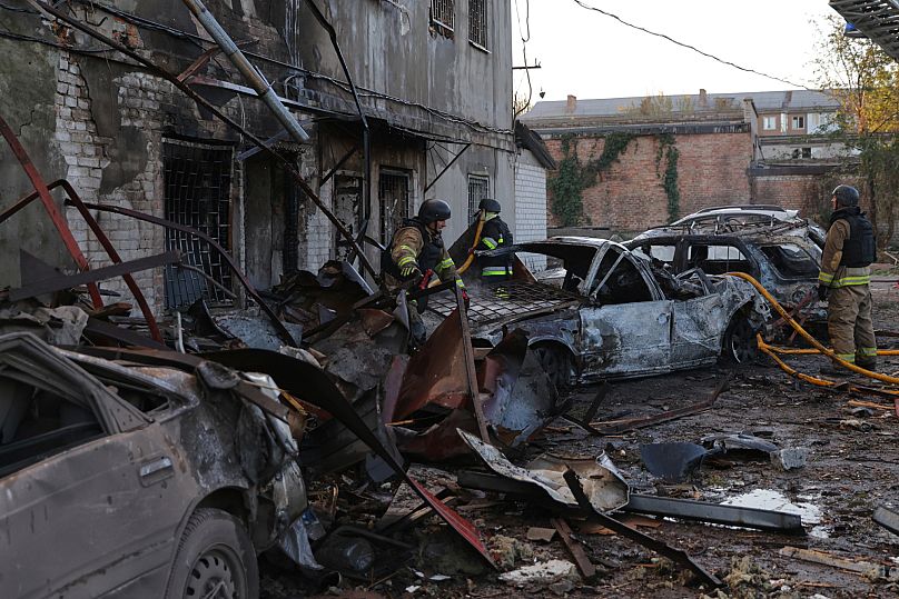 Rescuers work at a building destroyed during a Russian strike in Zaporizhzhia, 22 September, 2025