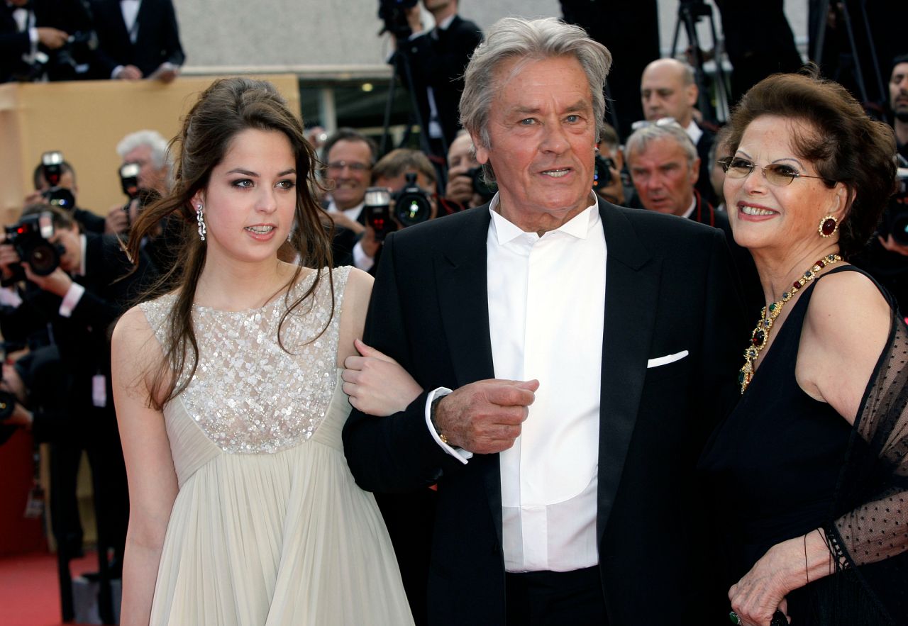 Alain Delon with his daughter Anouchka and Claudia Cardinale in Cannes, 14 May 2010 