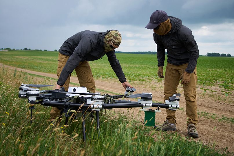 FILE: Engineers test a Ukrainian-made quadcopter drone at an undisclosed location in Ukraine, 12 June 2025
