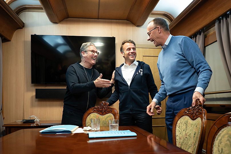 FILE: Keir Starmer, Emanuel Macron and Friedrich Merz onboard a train to the Ukrainian capital Kyiv where all three will hold meetings with Volodymyr Zelenskyy,  May 9, 2025