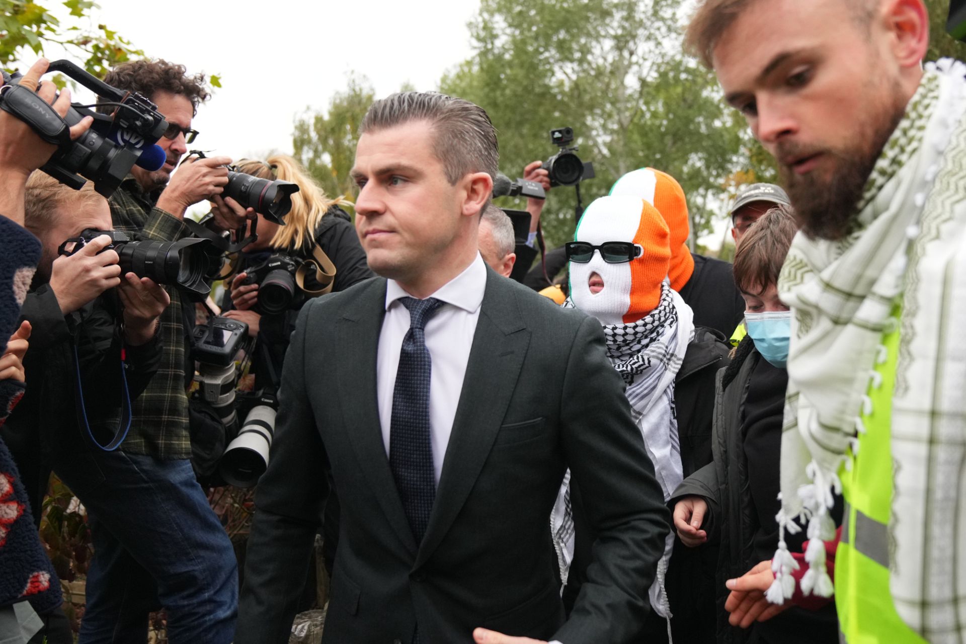 British court throws out terror-related charge against Kneecap member