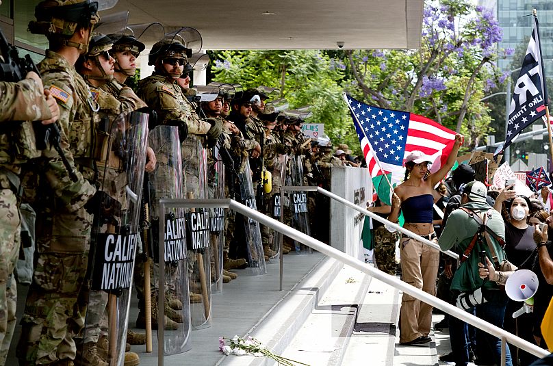 FILE: Protesters stand off against California National Guard soldiers at the Federal Building in downtown Los Angeles during a "No Kings" protest, 14 June 2025