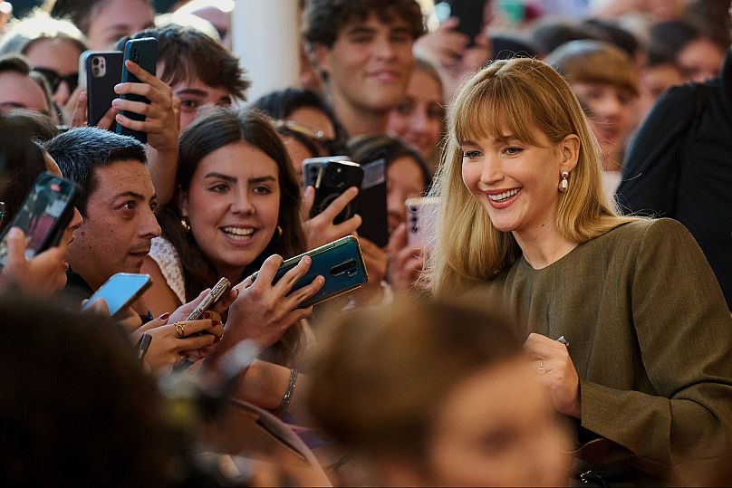 Meet and greet: Jennifer Lawrence signs autographs for fans before receiving the Donostia award at the San Sebastian Film Festival in northern Spain, 26 Sep 2025