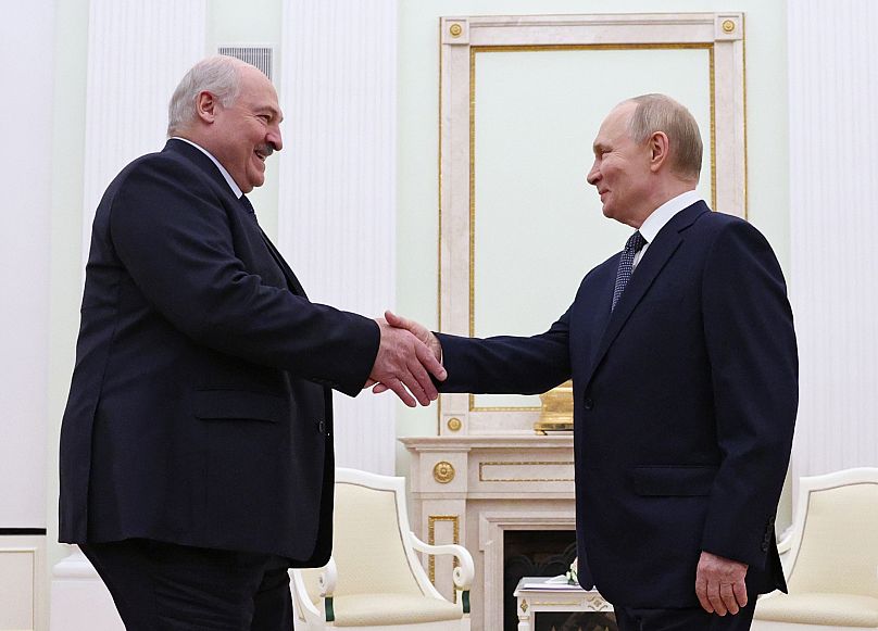 Russian President Vladimir Putin and Belarusian President Aliaksandr Lukashenka shake hands during their meeting at the Kremlin in Moscow, 26 September, 2025